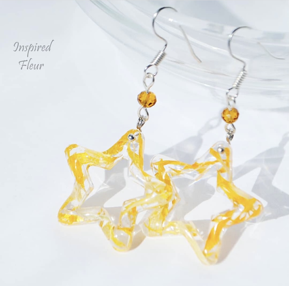 Cool star shape earrings with bright calendula petals, so juicy