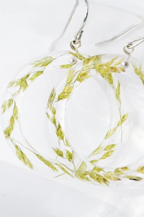 Round frames with spikelets dangle resin earrings